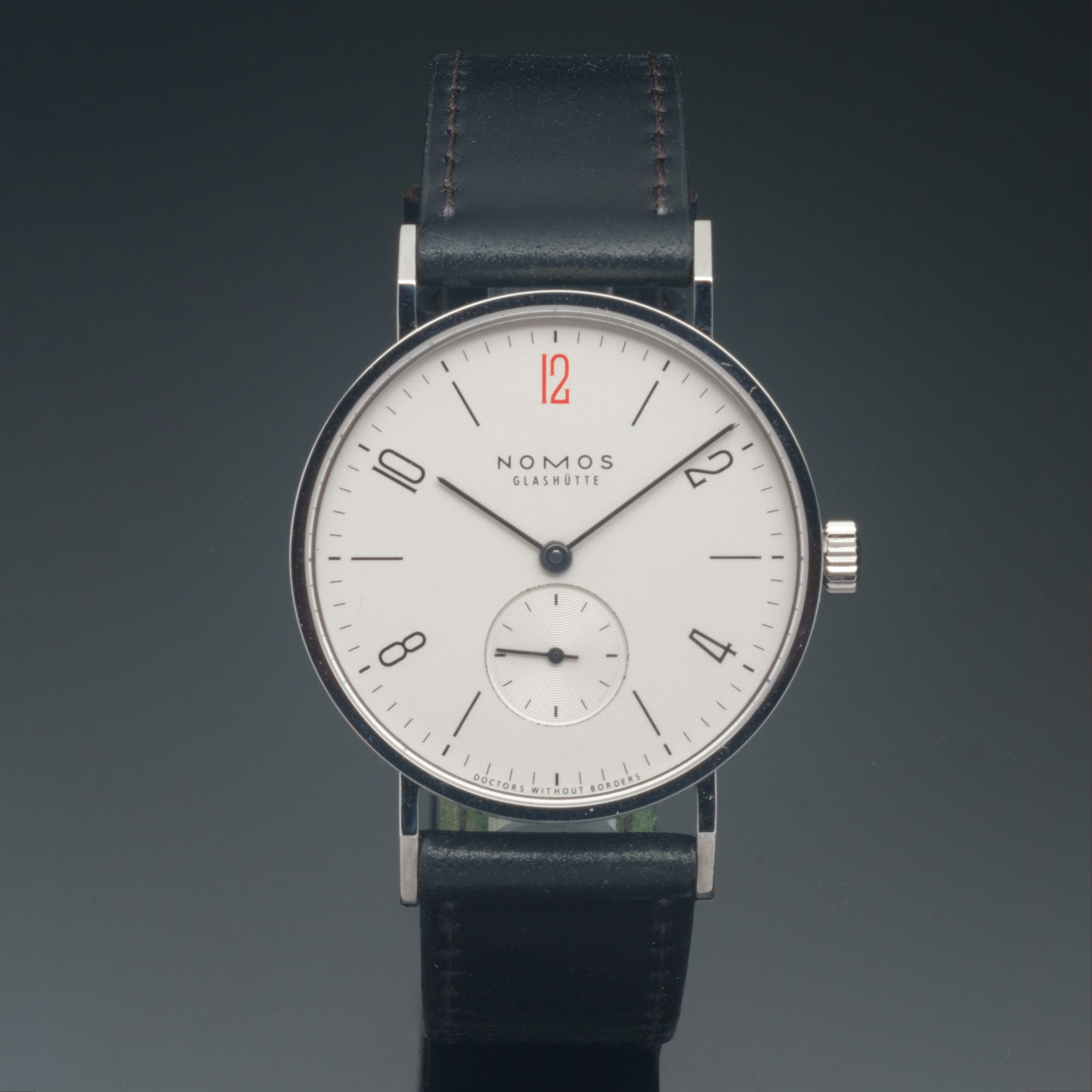 Nomos button image